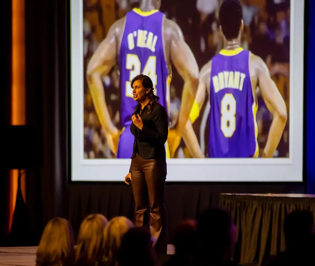 Anne Marie Anderson delivering a leadership keynote on stage